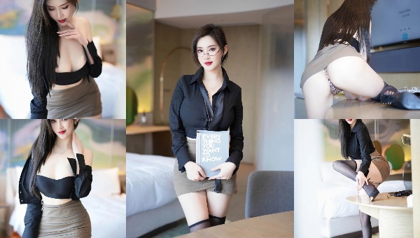 The secretary in glasses looks incredibly sexy