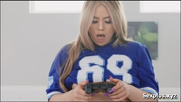 A slutty daughter wears panties while playing video games in front of her stepfather