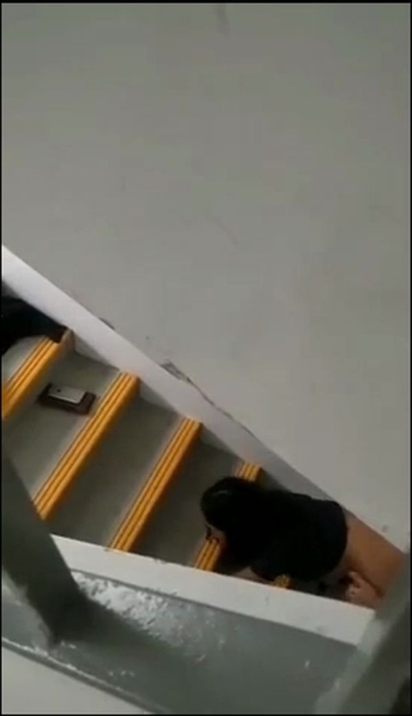 In broad daylight, a couple was having sex on the stairs