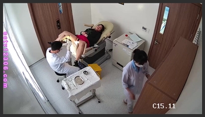 Covert filming in a gynecology clinic. A beautiful woman in a red dress undergoing a gynecological exam