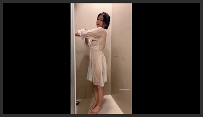TikToker Nguyen Thi Huong Shows Off Her Body in a Shower