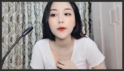 Applying makeup and wearing sexy clothes for fans to admire