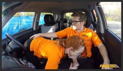 A redheaded British babe gets her perfect pussy fucked while driving