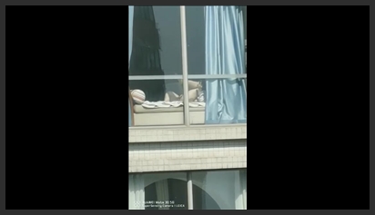 Full video of a girl masturbating in an apartment building